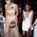 Bella Hadid Dior Dress with Shimmering Clutch Bag