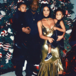 Kanye, Kim, and the kids posed in front of Kris’ massive Christmas tree.
