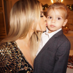 Khloe planted a kiss on her nephew, Reign.